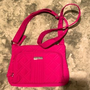 Hot fuchsia pink Vera Bradley bag with lots of pockets